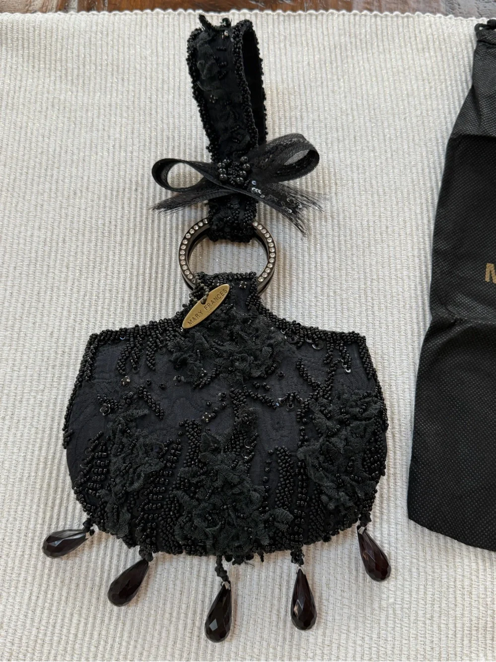 Mary Frances Black Beaded Wristlet Clutch with Rhinestone Ring & Bow Accent